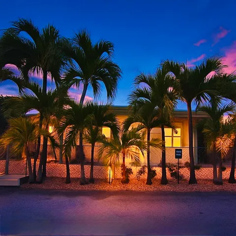 a view of multiple houses with a yard