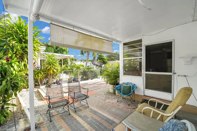 a building outdoor space with patio furniture