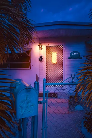 a view of a room with a wooden floor