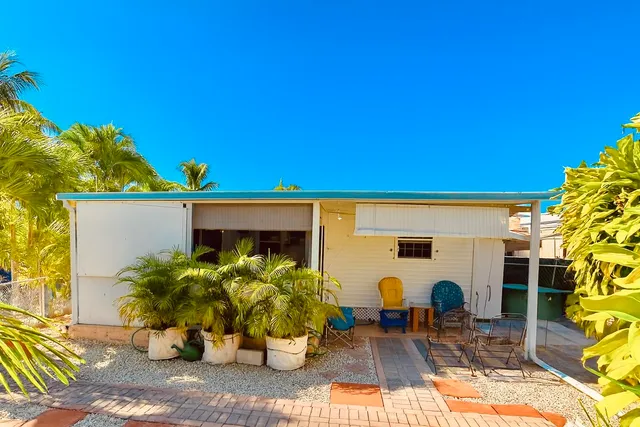 a front view of a house with patio