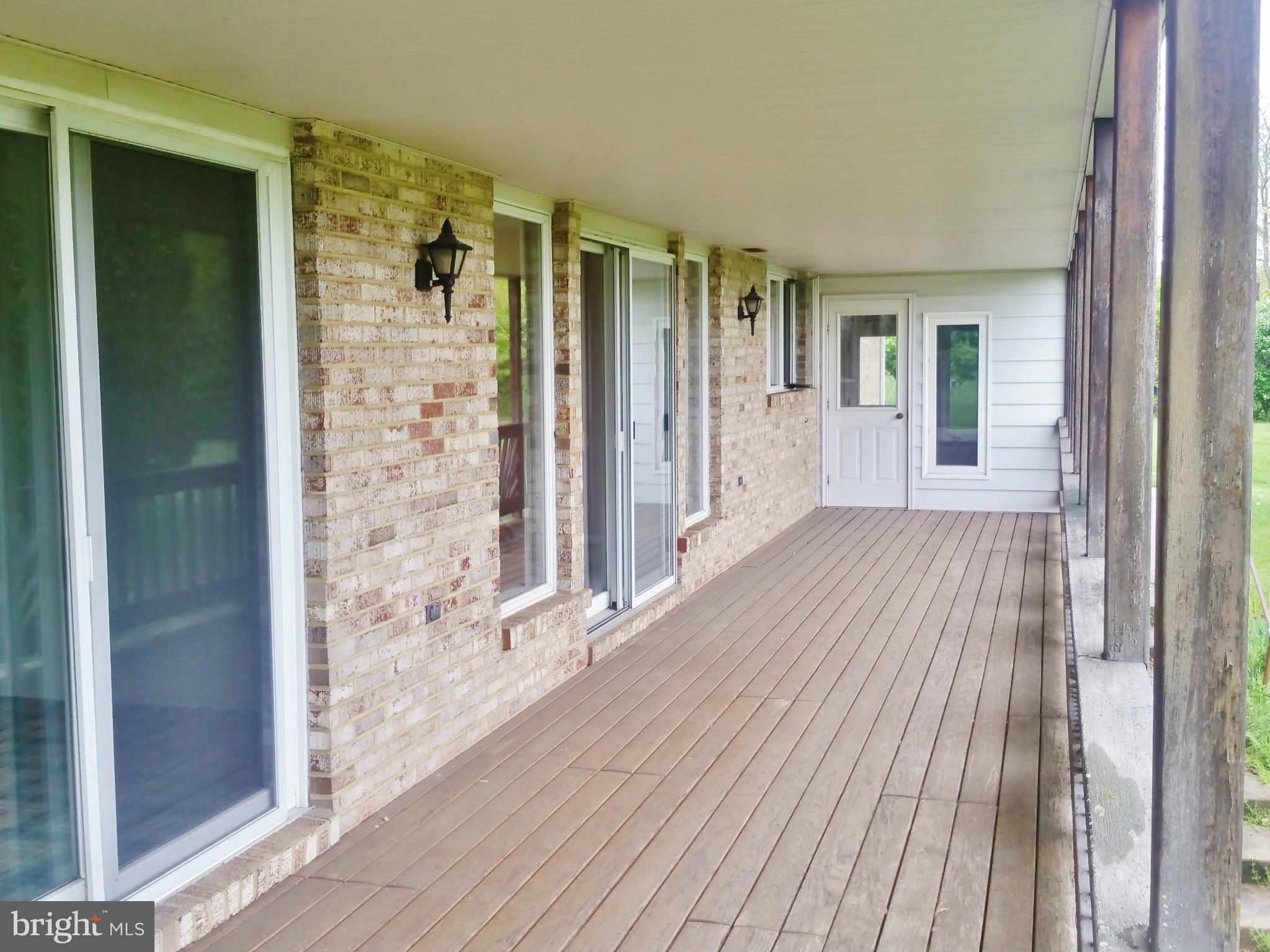 33 John Owings Road Westminster, MD 21158 - Photo 2 of 30 Deck also Connects to Enclosed Porch