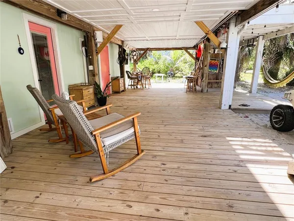 a kitchen with a sink stove and microwave