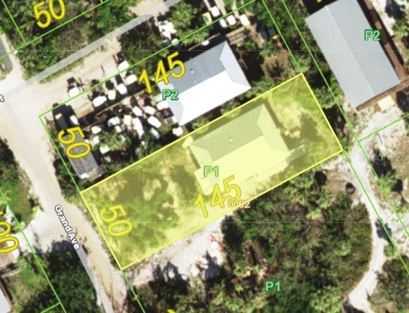 an aerial view of a house with a garden and plants