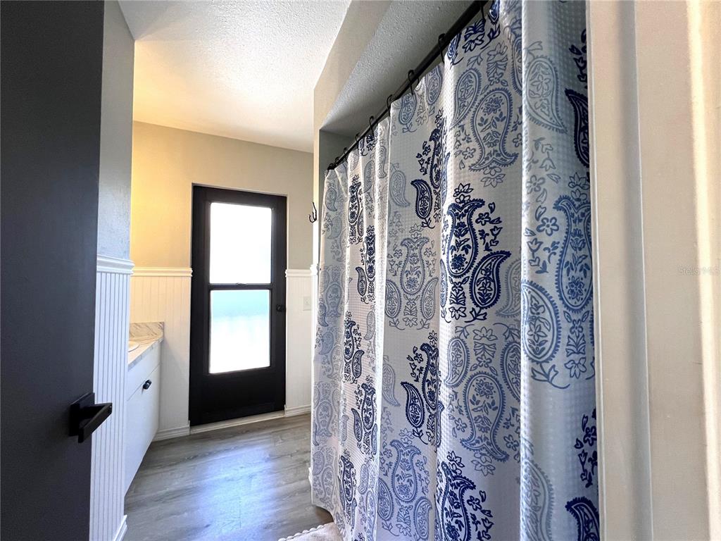 8662 Grand Avenue Boca Grande, FL 33921 - Photo 37 of 63 a view of front door with wooden floor