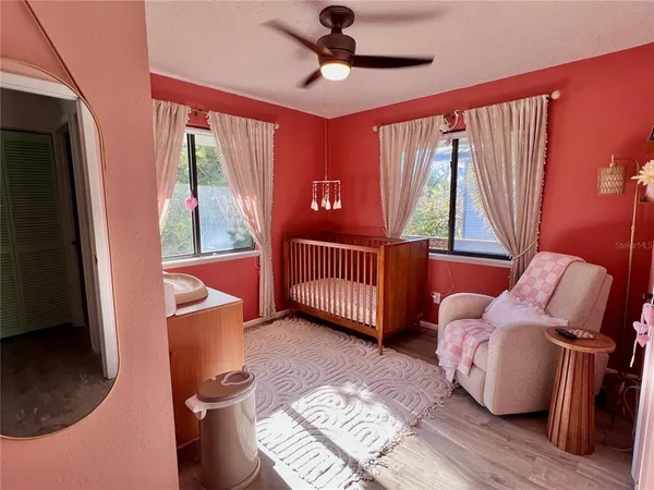 a view of a pathway with a big yard