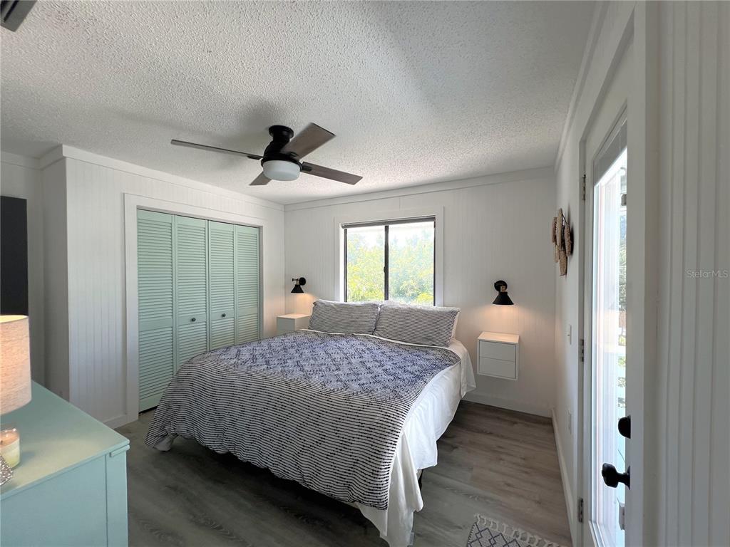 8662 Grand Avenue Boca Grande, FL 33921 - Photo 47 of 68 a bedroom with a bed and a window