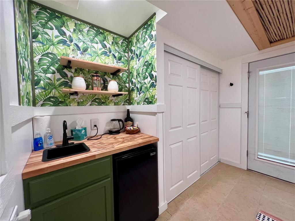 8662 Grand Avenue Boca Grande, FL 33921 - Photo 55 of 63 a room that has a window and a table in it