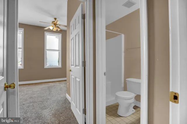 a bathroom with a toilet