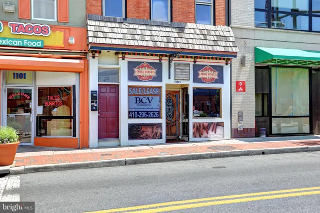 a building on the side of a street