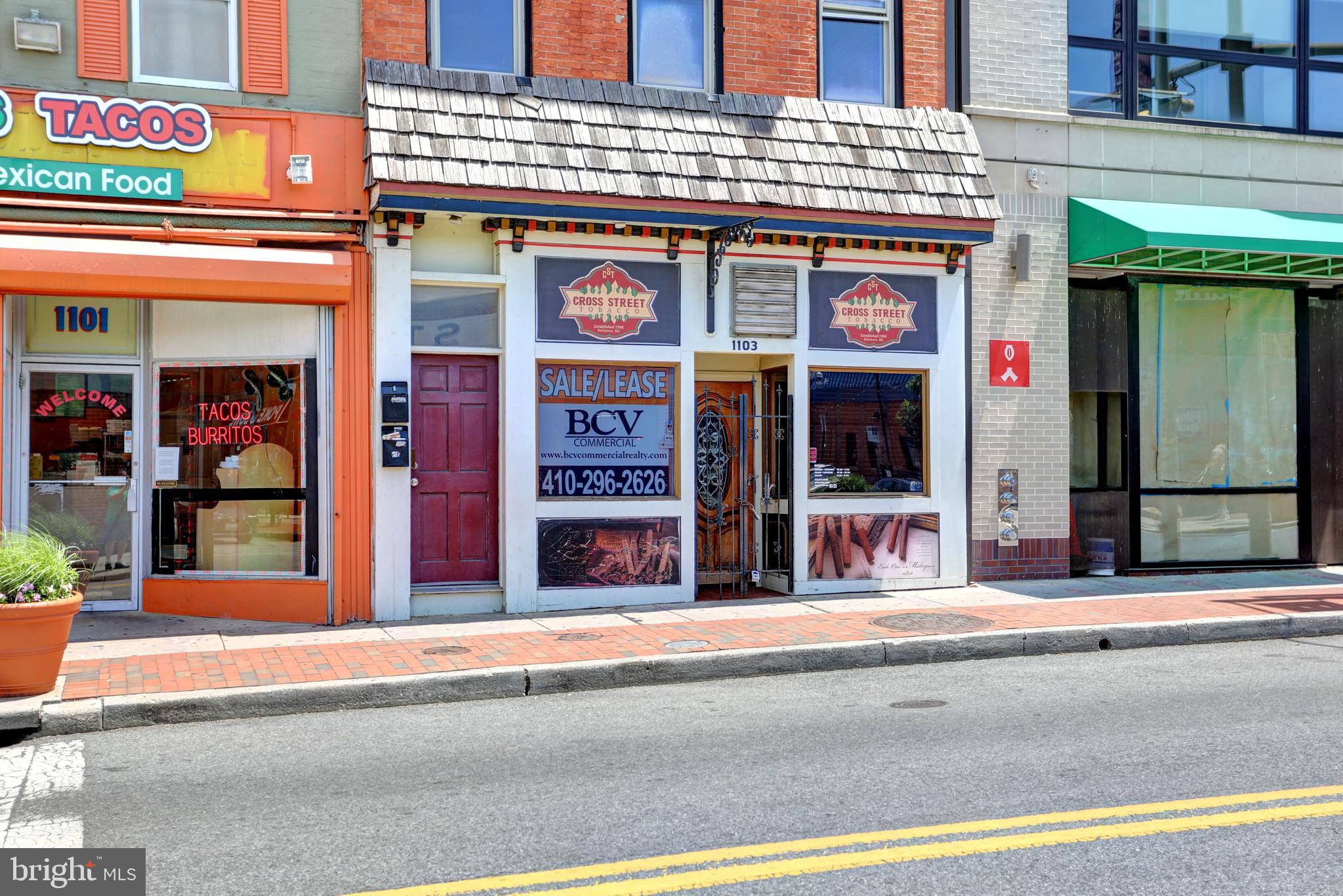 1103 Light Street, Unit A Baltimore, MD 21230 - Photo 21 of 23 a building on the side of a street