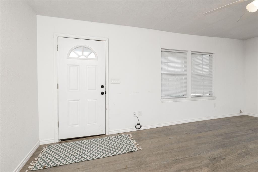 205 Highway 101 Chico, TX 76431 - Photo 3 of 29 Front door leading to living room.