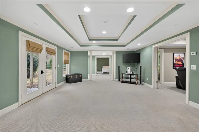 a view of a livingroom with couch and a large window