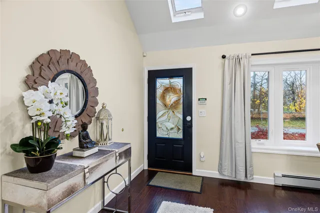 a view of living room with wooden floor