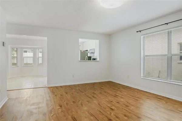 a kitchen with stainless steel appliances a stove a sink and a refrigerator