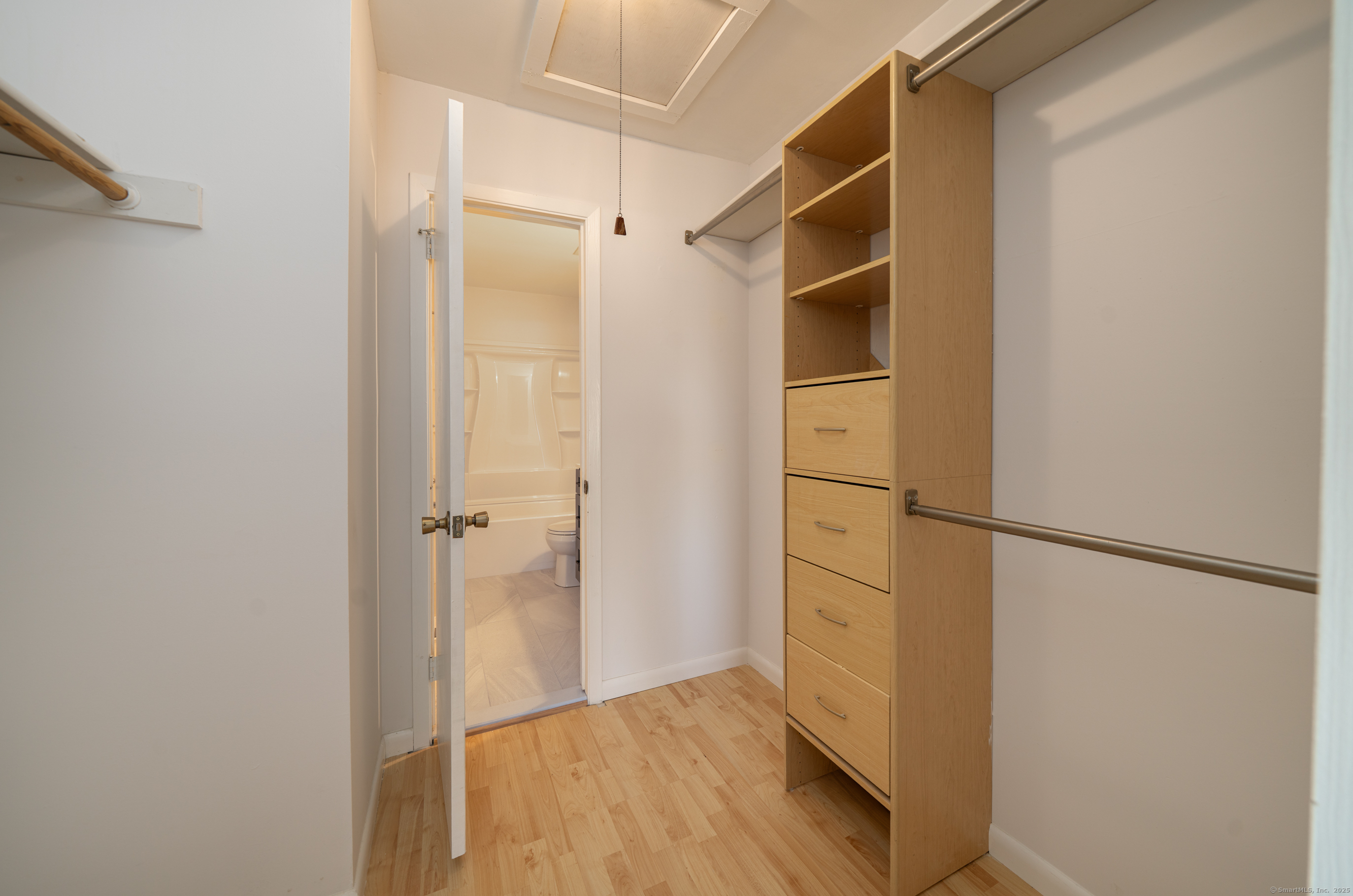 323 Walden Green Road, Unit 323 Branford, CT 06405 - Photo 9 of 21 walk in closet with built in storage