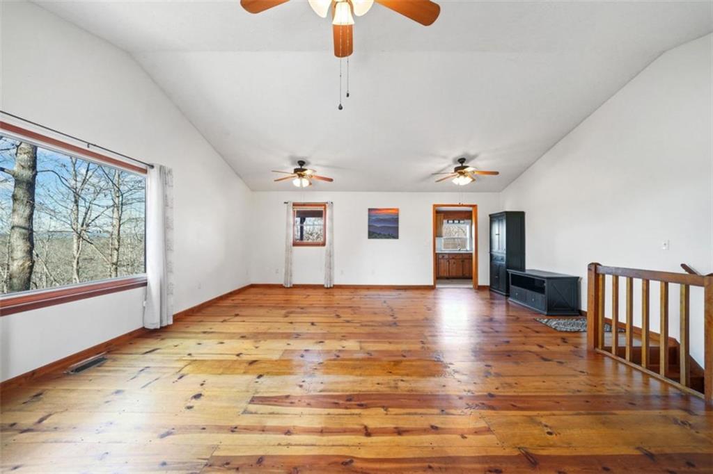 421 Cherokee Court Ellijay, GA 30540 - Photo 11 of 62 a view of a livingroom with wooden floor and window