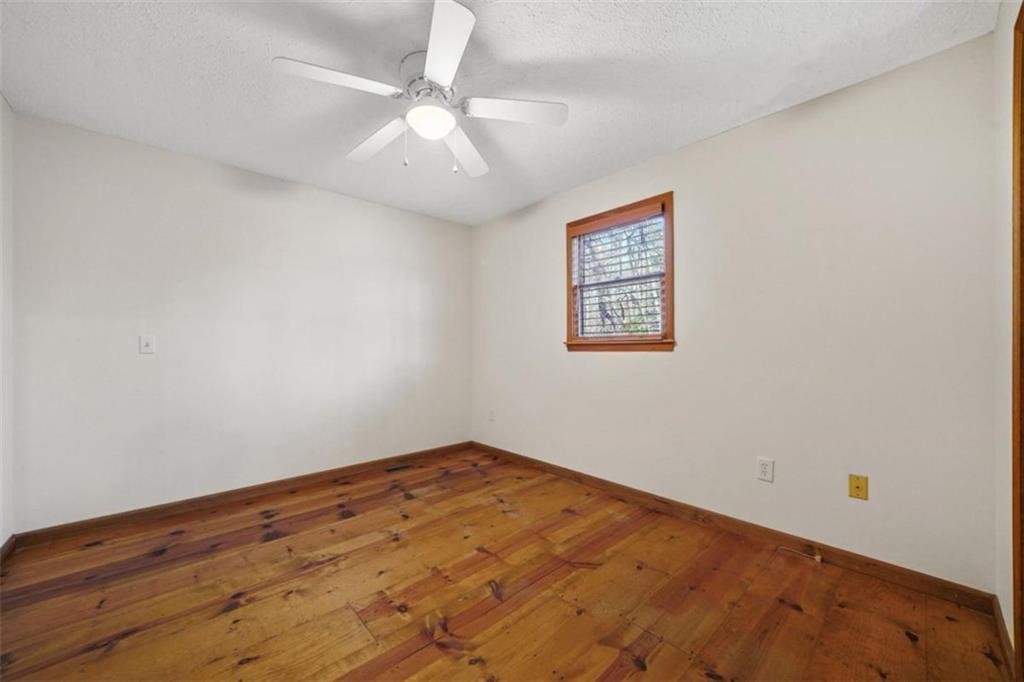 421 Cherokee Court Ellijay, GA 30540 - Photo 21 of 62 an empty room with a window