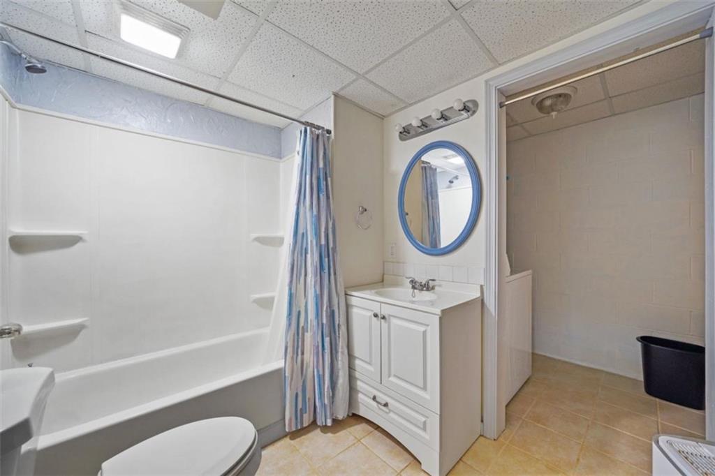 421 Cherokee Court Ellijay, GA 30540 - Photo 26 of 62 a bathroom with a toilet a sink and a bathtub