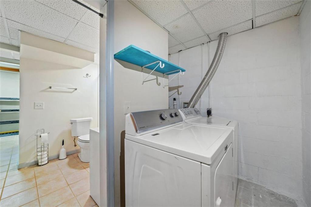 421 Cherokee Court Ellijay, GA 30540 - Photo 27 of 62 a utility room with dryer and washer