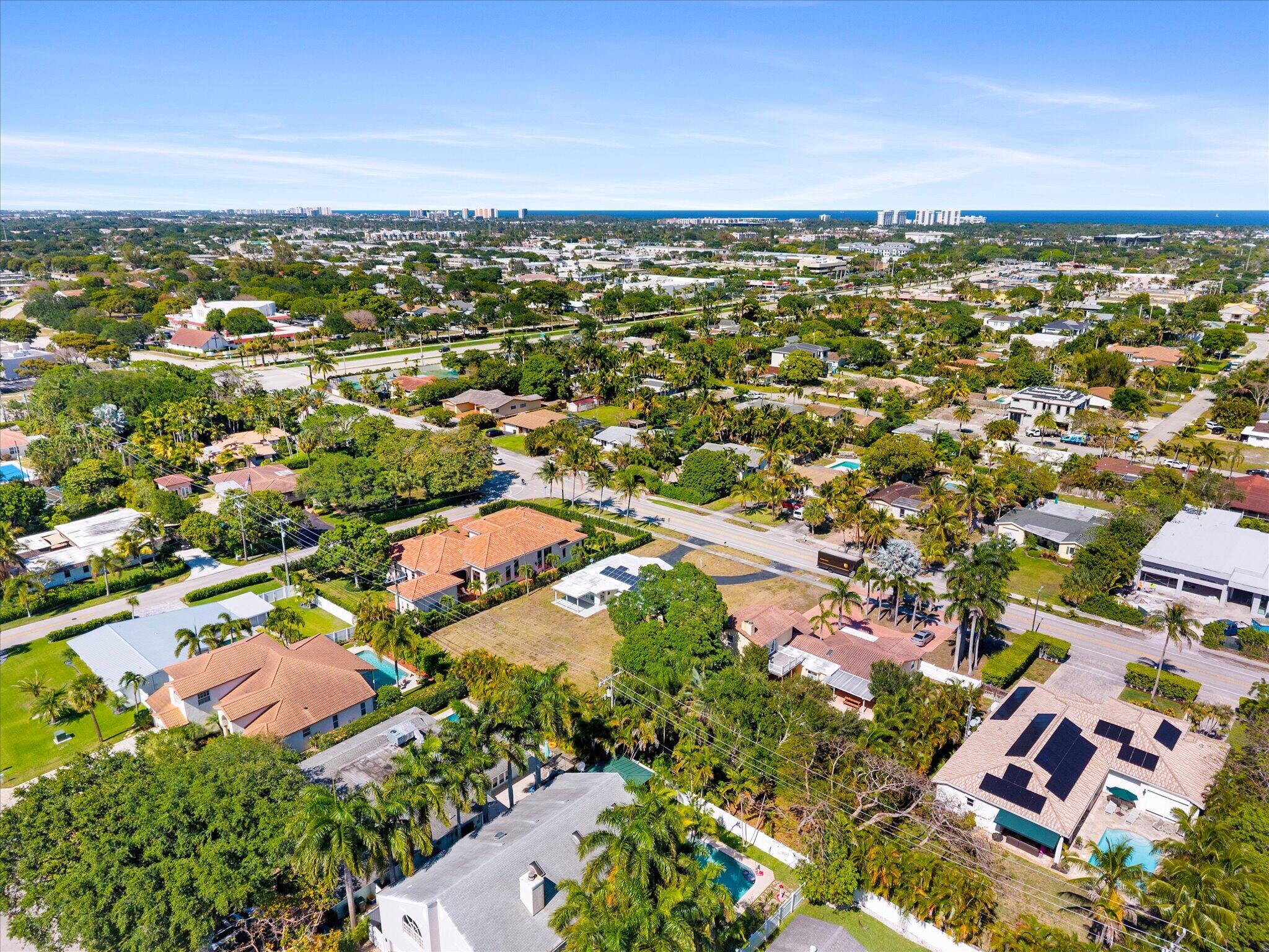 1035 Northwest 4th Avenue Boca Raton, FL 33432 - Photo 12 of 16 an aerial view of residential building with parking