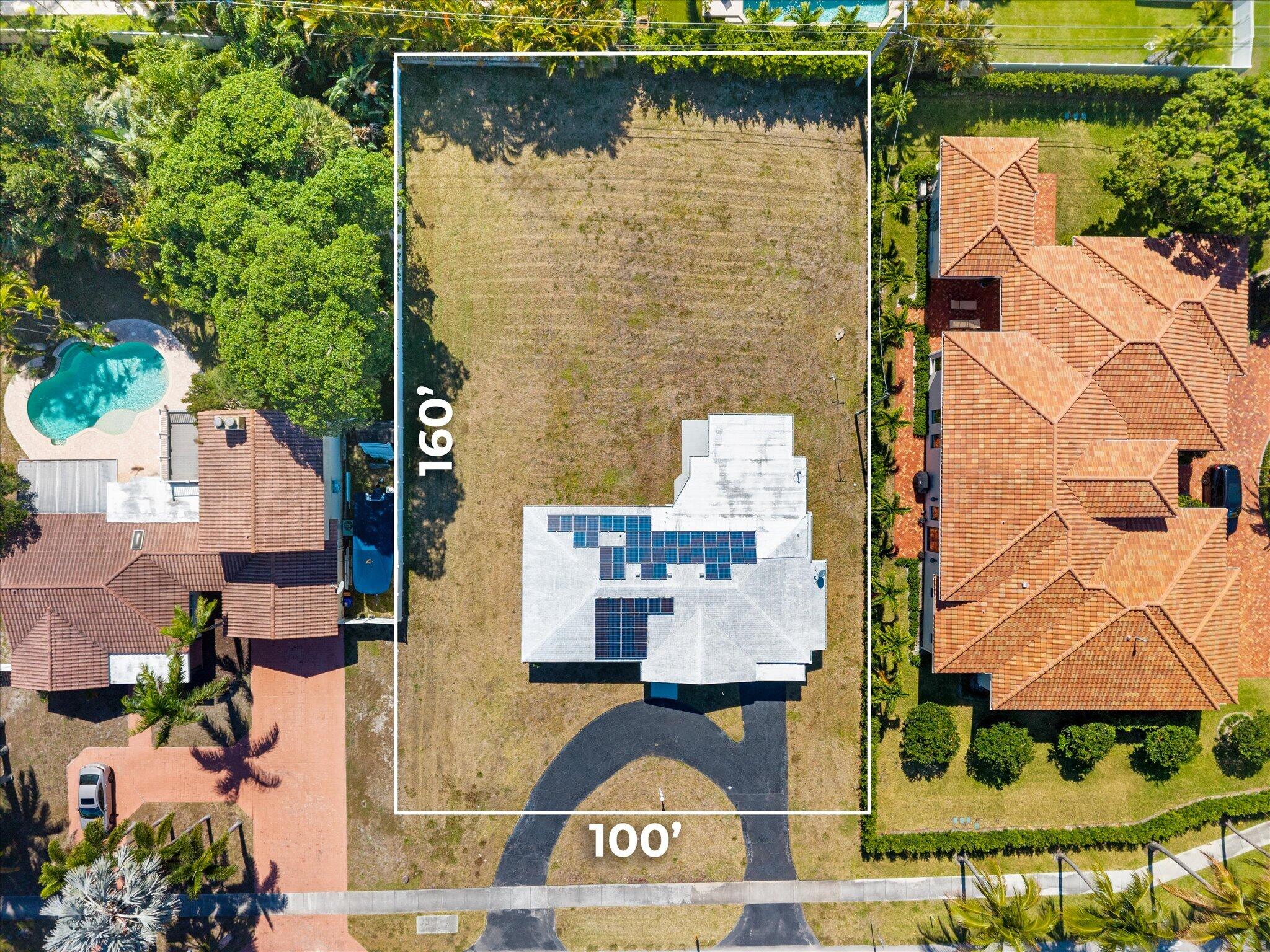 1035 Northwest 4th Avenue Boca Raton, FL 33432 - Photo 2 of 16 an aerial view of residential house with outdoor space and lake view