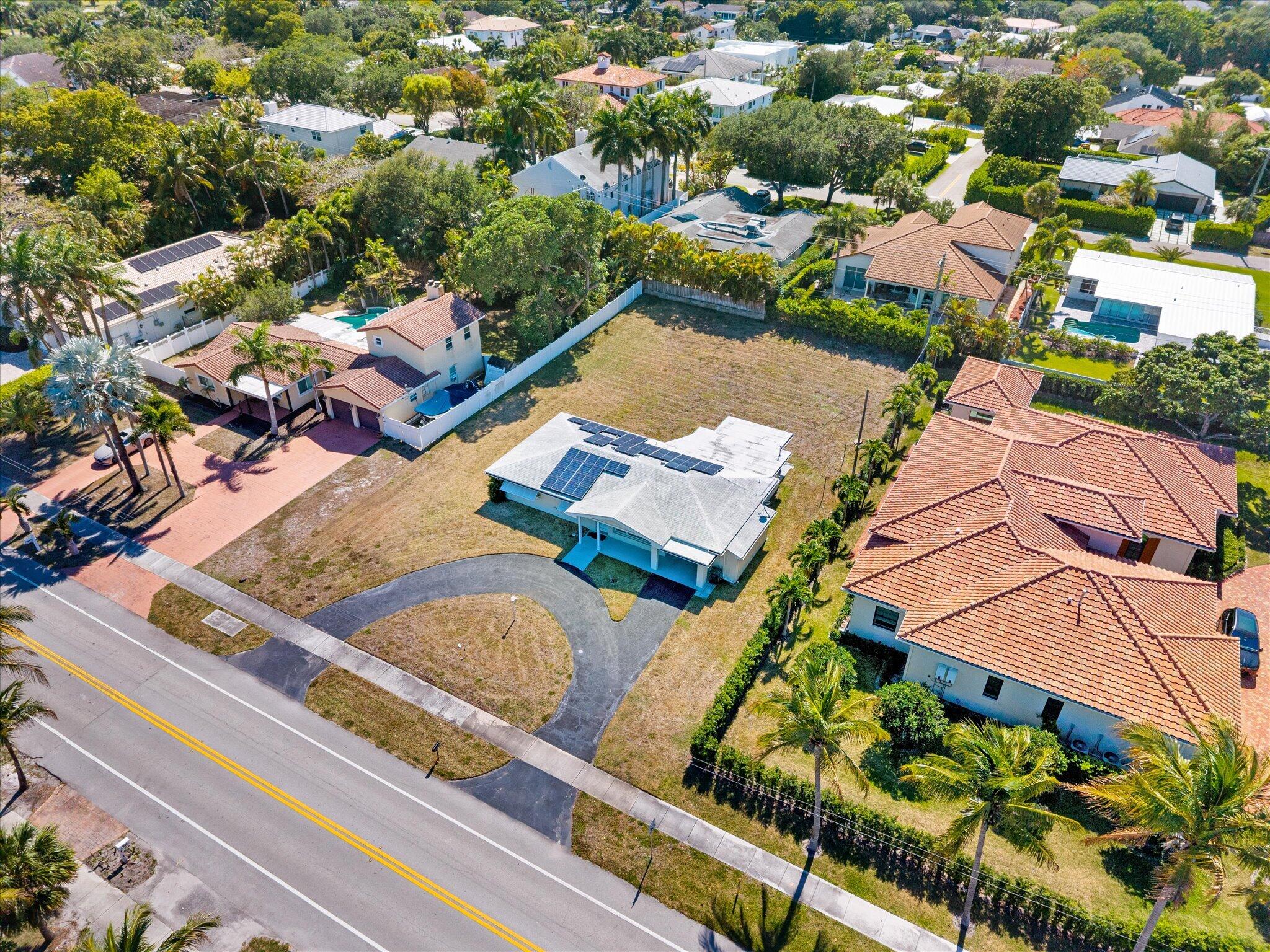 1035 Northwest 4th Avenue Boca Raton, FL 33432 - Photo 3 of 16 an aerial view of residential houses with outdoor space