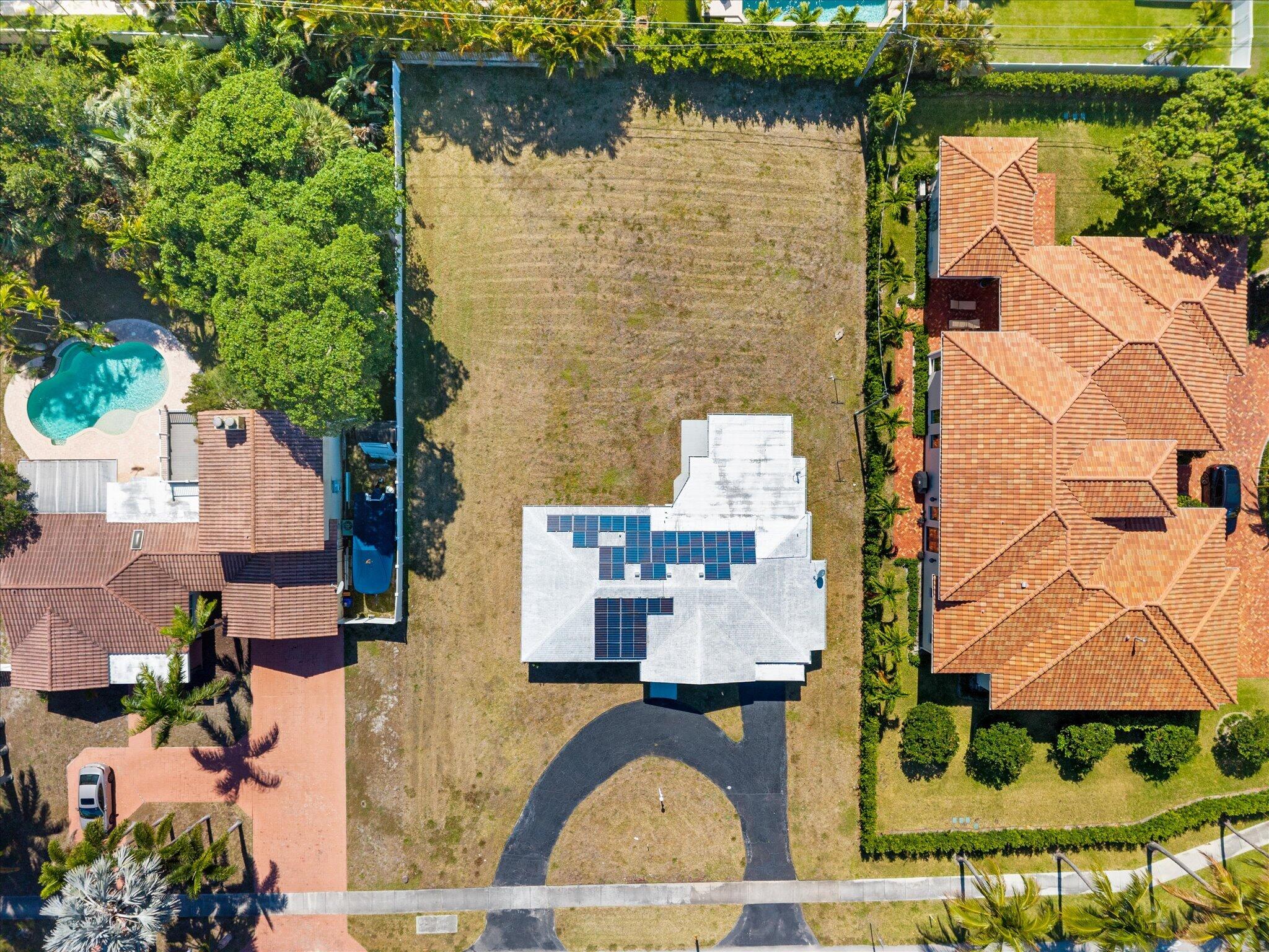 1035 Northwest 4th Avenue Boca Raton, FL 33432 - Photo 6 of 16 an aerial view of residential houses with outdoor space and street view
