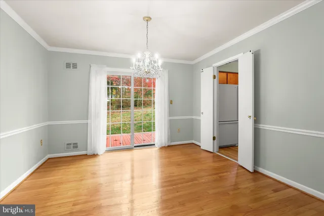 a kitchen with a refrigerator sink and microwave