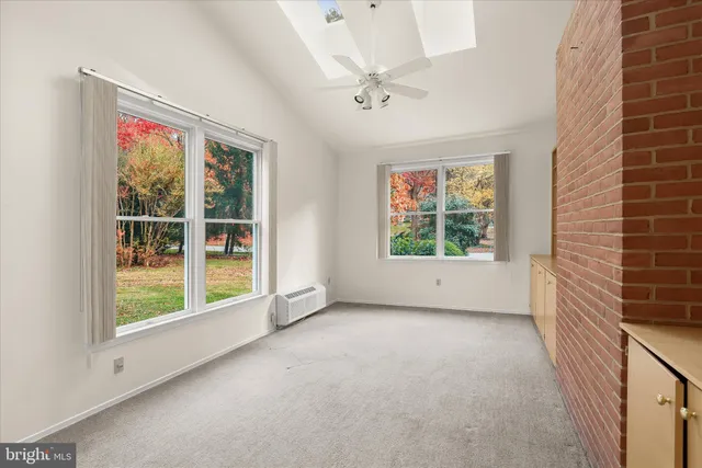 a view of kitchen and wooden floor