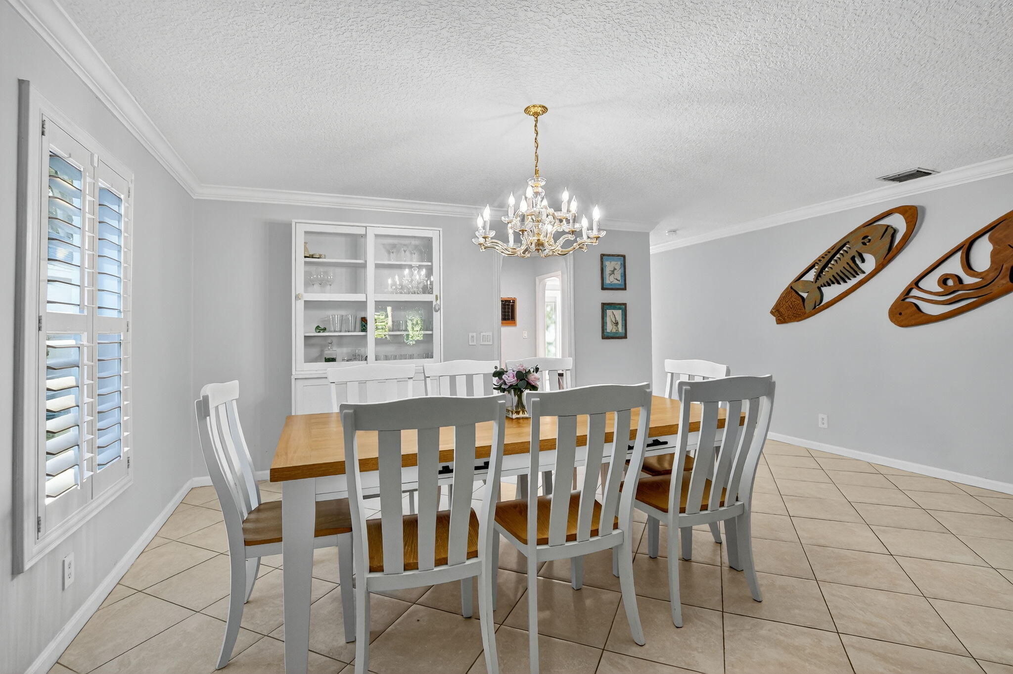 501 Southwest 1st Street Boca Raton, FL 33432 - Photo 14 of 69 a view of a dining room with furniture and window