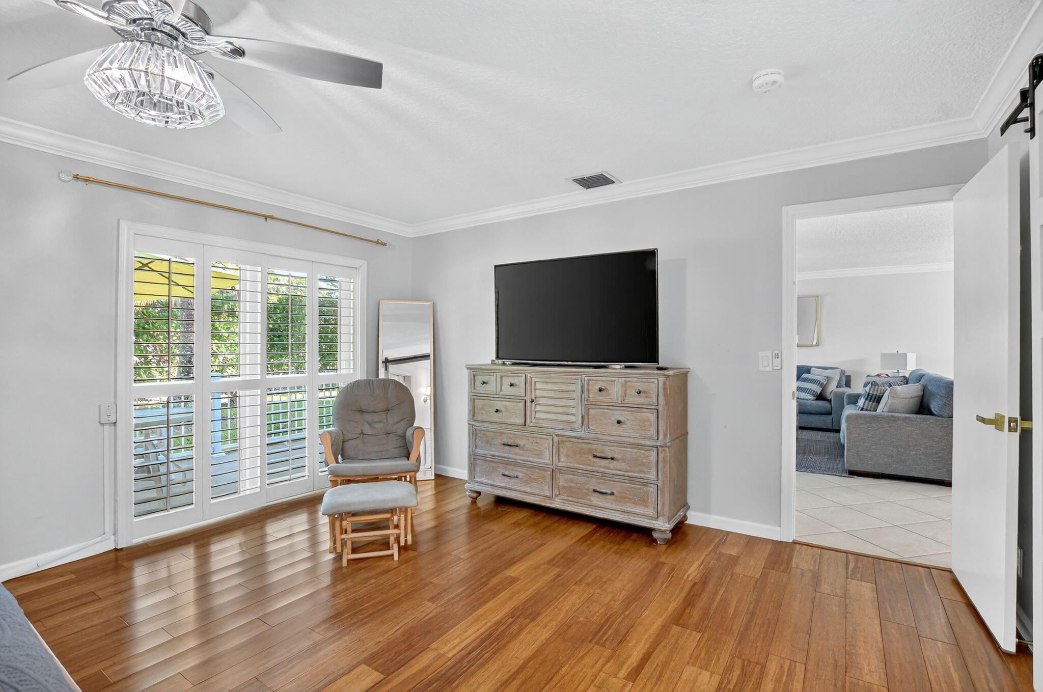 501 Southwest 1st Street Boca Raton, FL 33432 - Photo 20 of 69 a living room with furniture and a flat screen tv