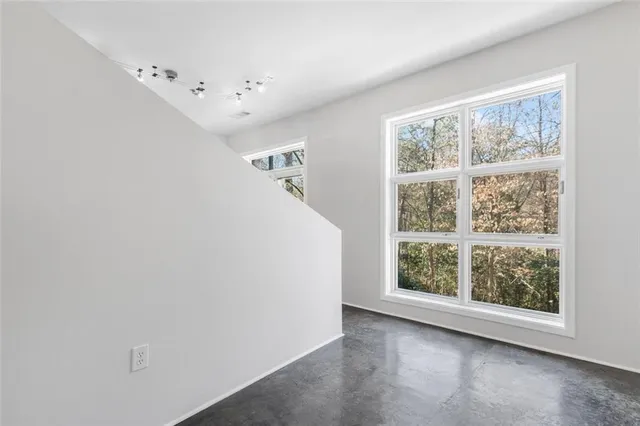 an empty room with windows