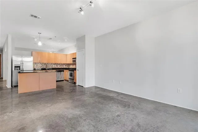 a view of a kitchen with a sink