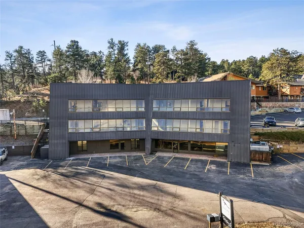 a front view of a building with street view