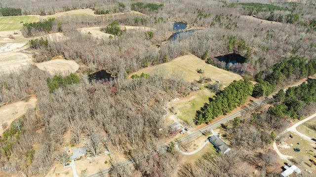 a view of a backyard of the house