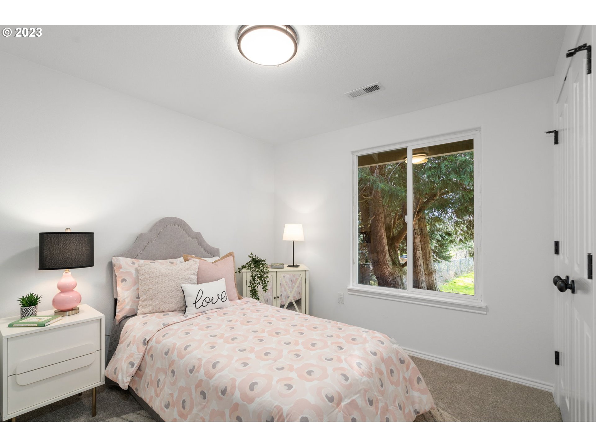 21055 South Ferguson Road Oregon City, OR 97045 - Photo 23 of 46 a bedroom with a bed and a window