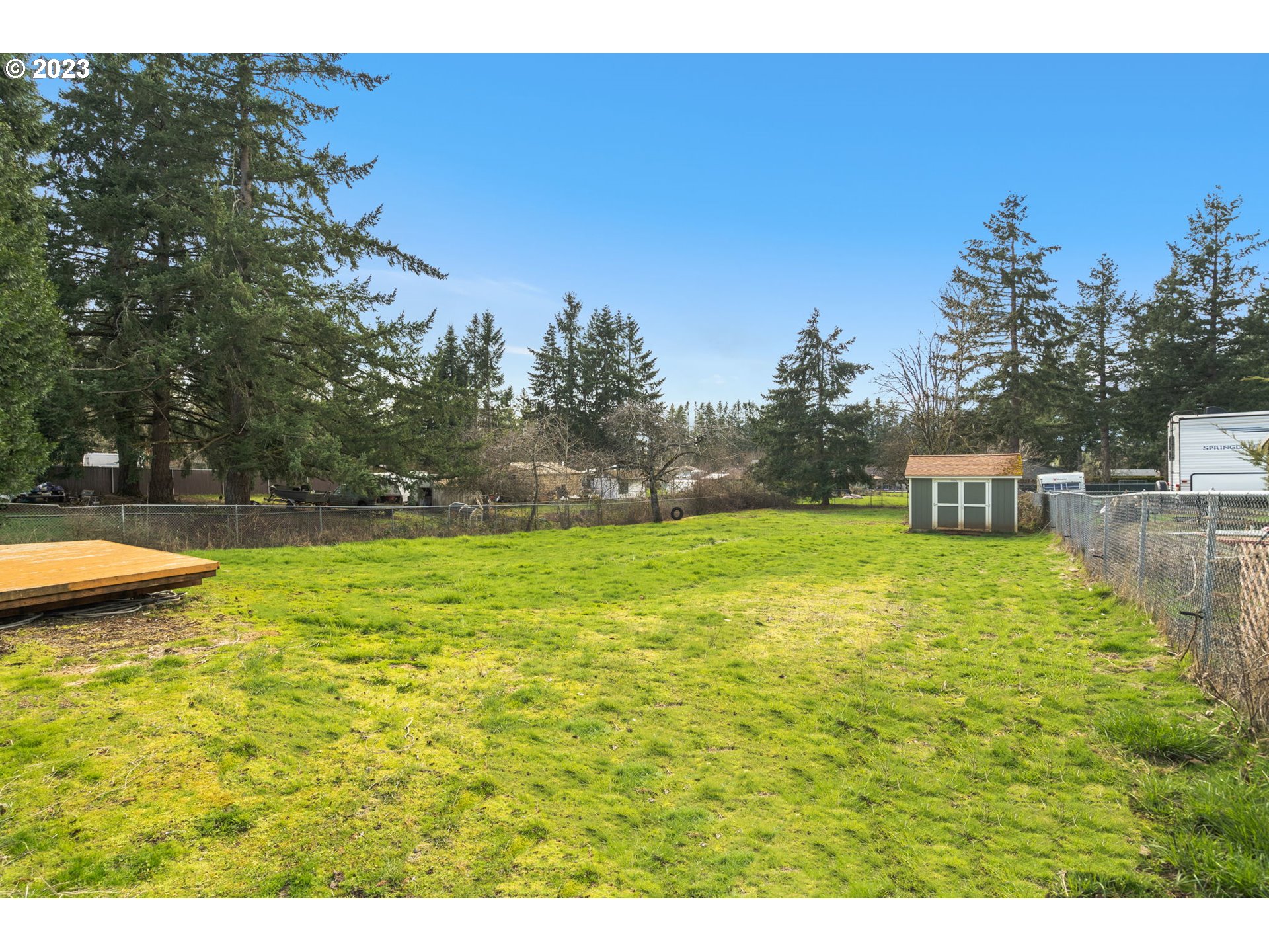 21055 South Ferguson Road Oregon City, OR 97045 - Photo 29 of 46 a view of a swimming pool with a yard