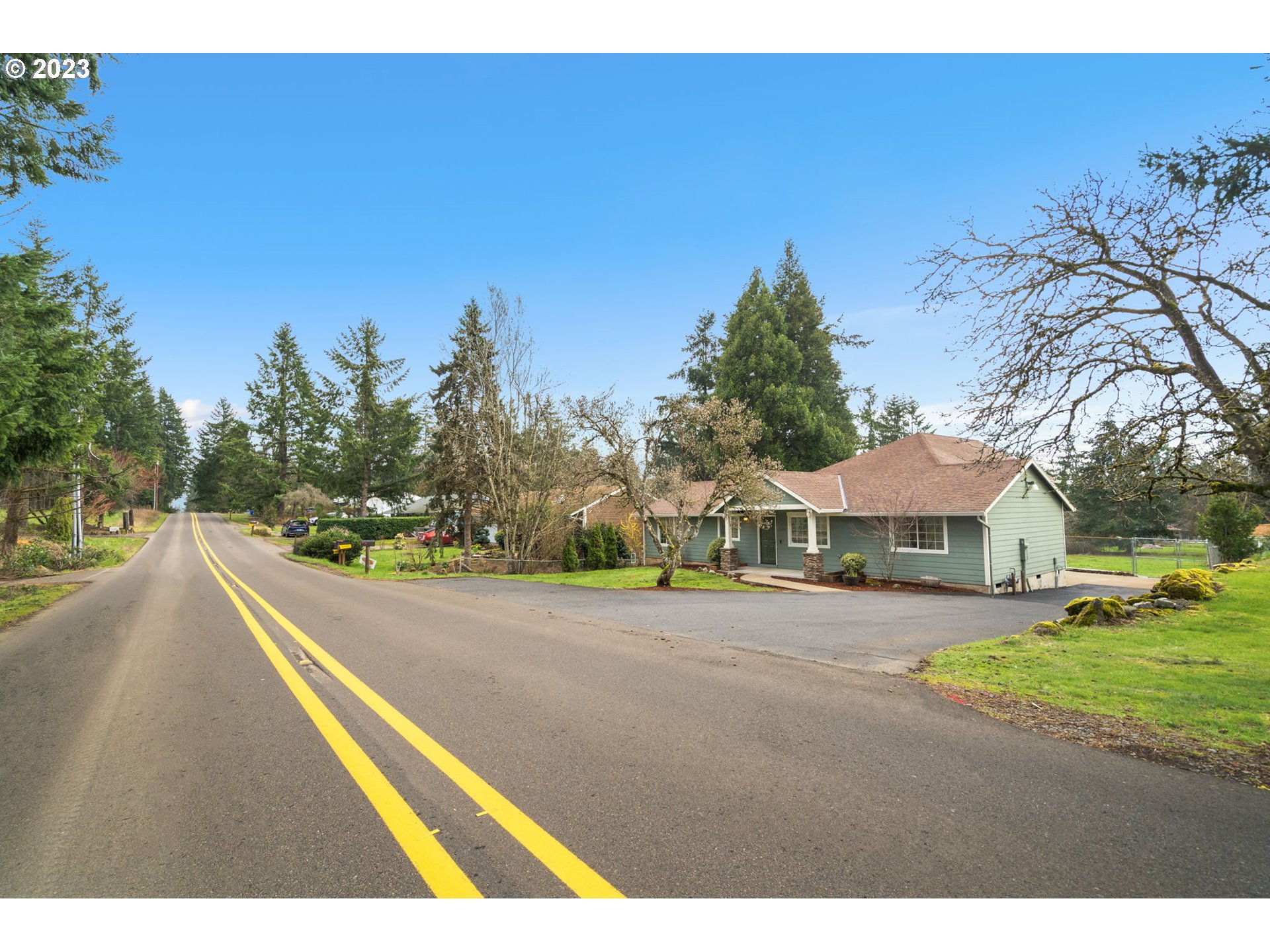 21055 South Ferguson Road Oregon City, OR 97045 - Photo 36 of 46 a view of a house with a yard