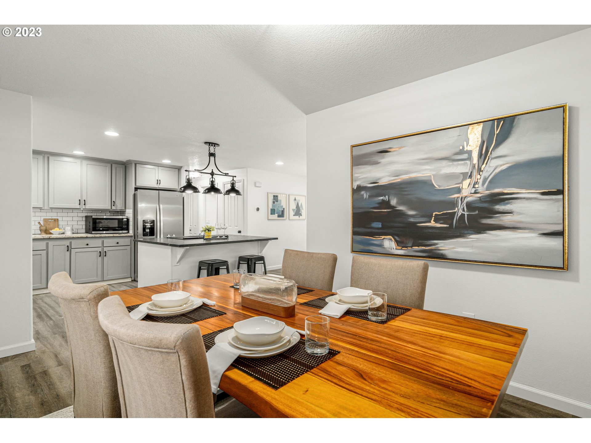 21055 South Ferguson Road Oregon City, OR 97045 - Photo 4 of 46 a living room with stainless steel appliances kitchen island granite countertop furniture and a view of kitchen