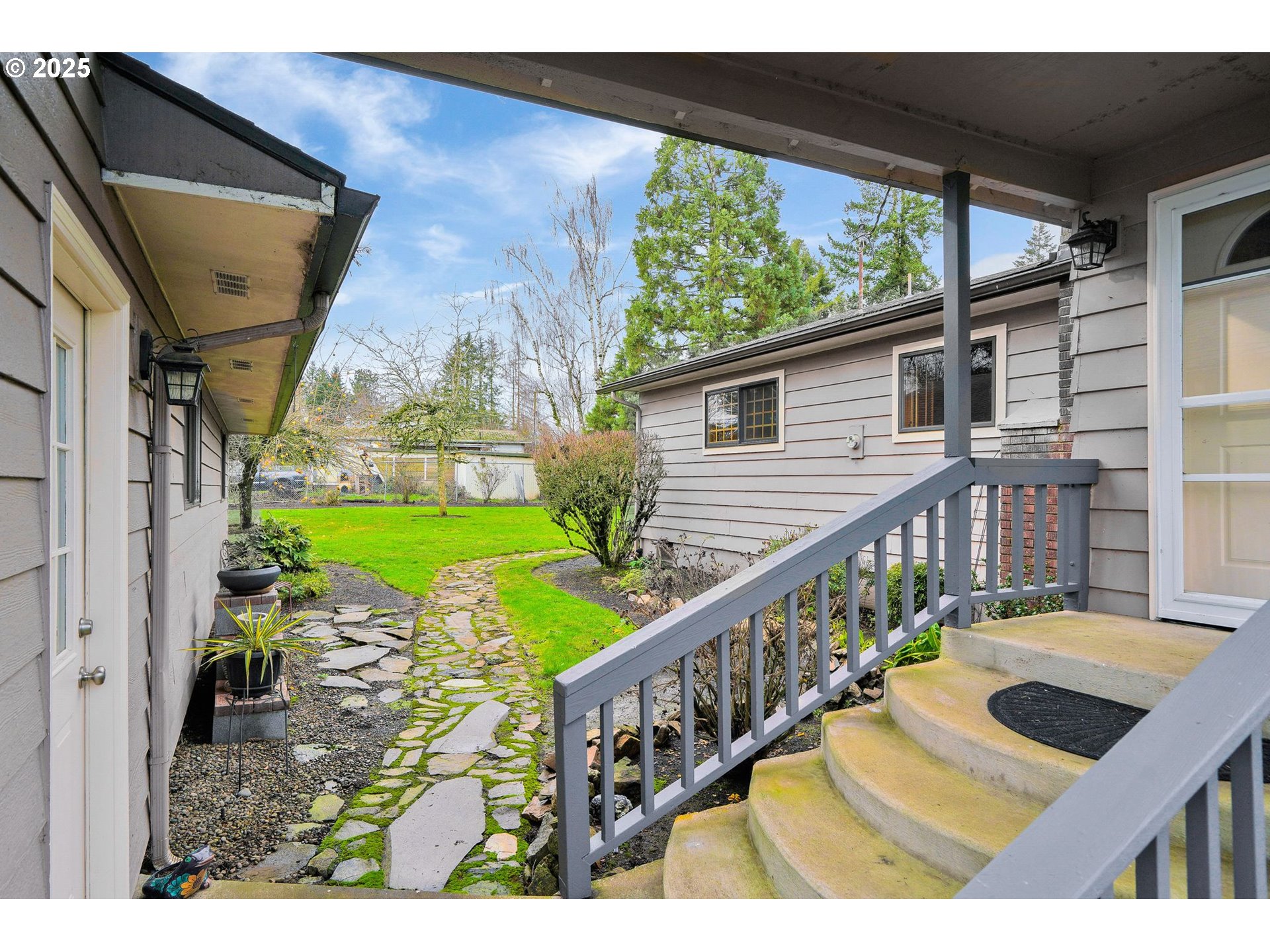 11515 Buena Vista Road Independence, OR 97351 - Photo 2 of 45 a house view with a garden space