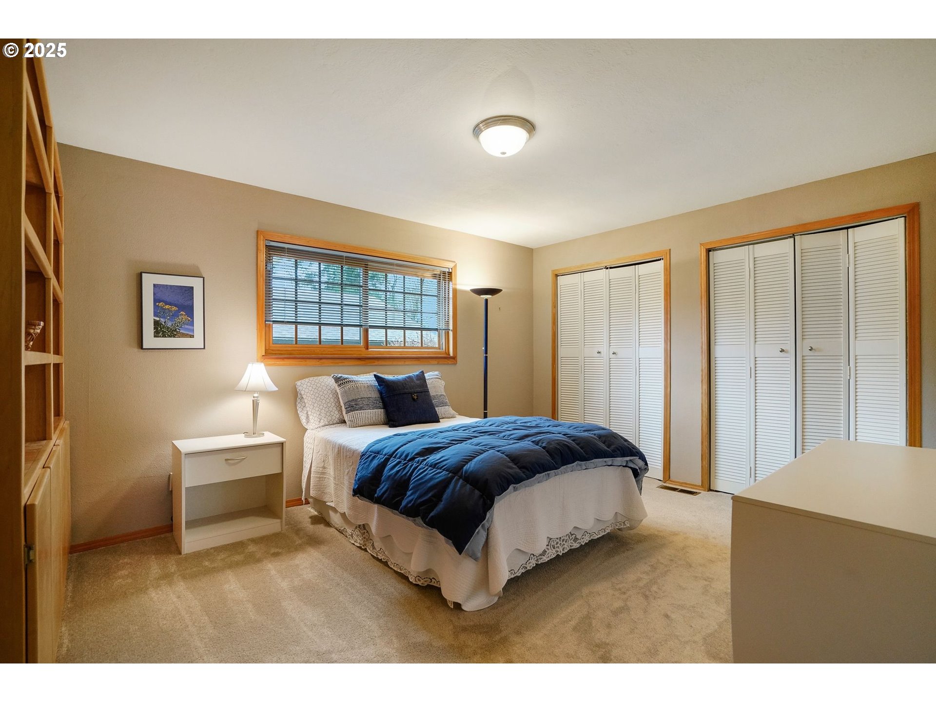 11515 Buena Vista Road Independence, OR 97351 - Photo 21 of 45 a bedroom with a bed and a window
