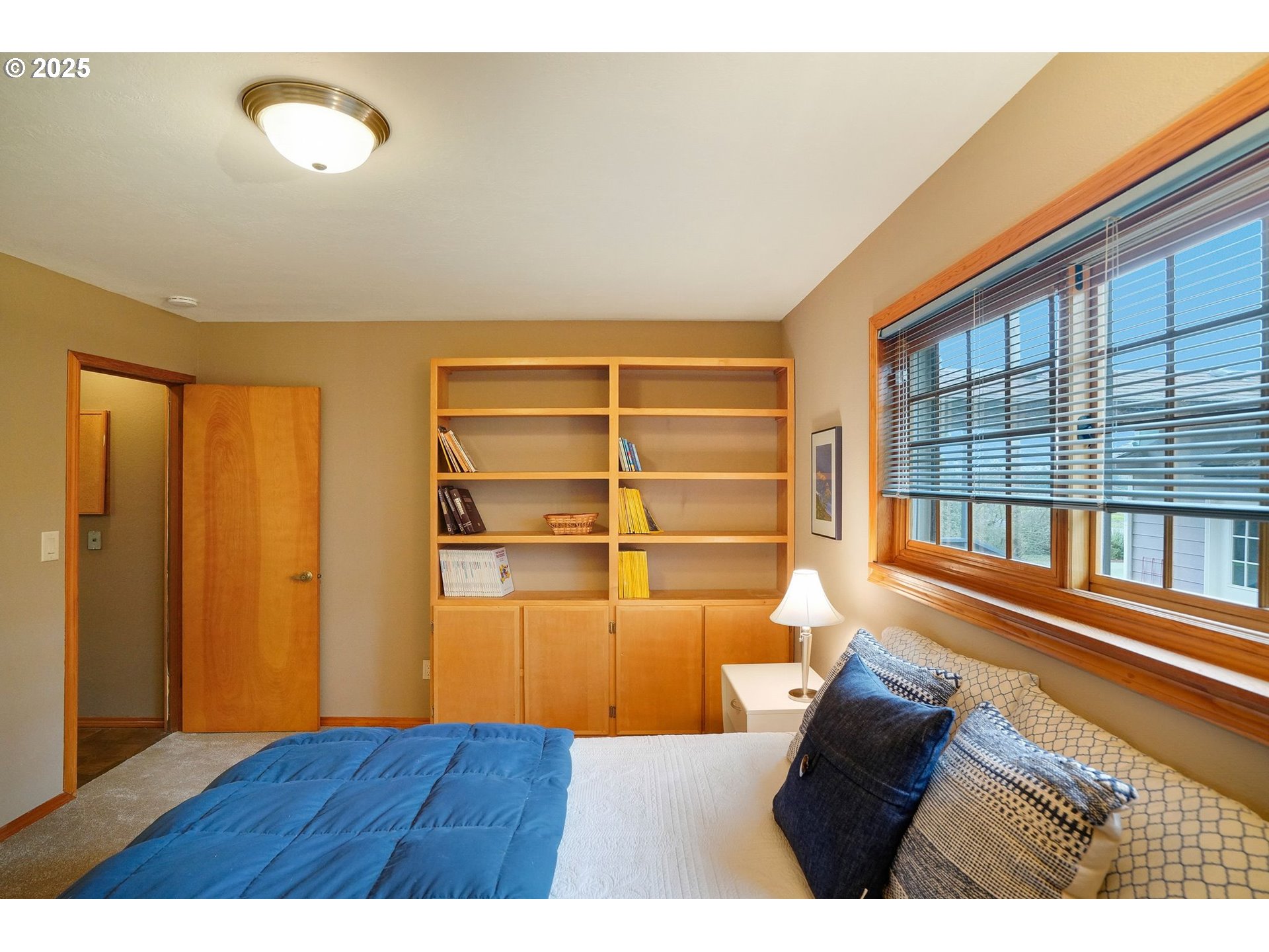 11515 Buena Vista Road Independence, OR 97351 - Photo 22 of 45 a view of empty room with wooden floor and fan