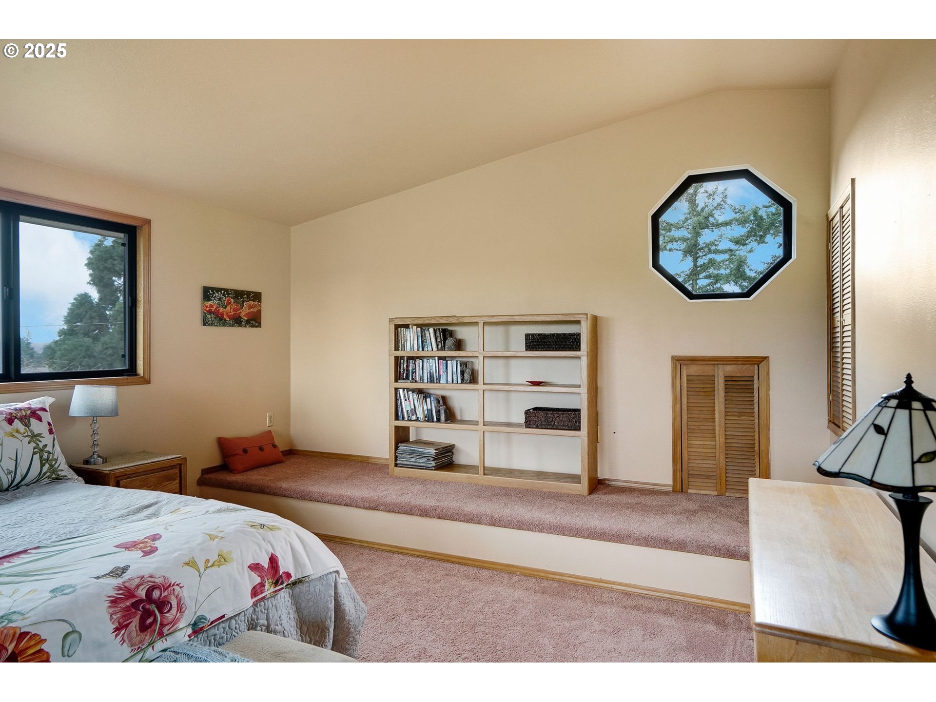 11515 Buena Vista Road Independence, OR 97351 - Photo 31 of 45 a bedroom with a bed and a painting on the wall