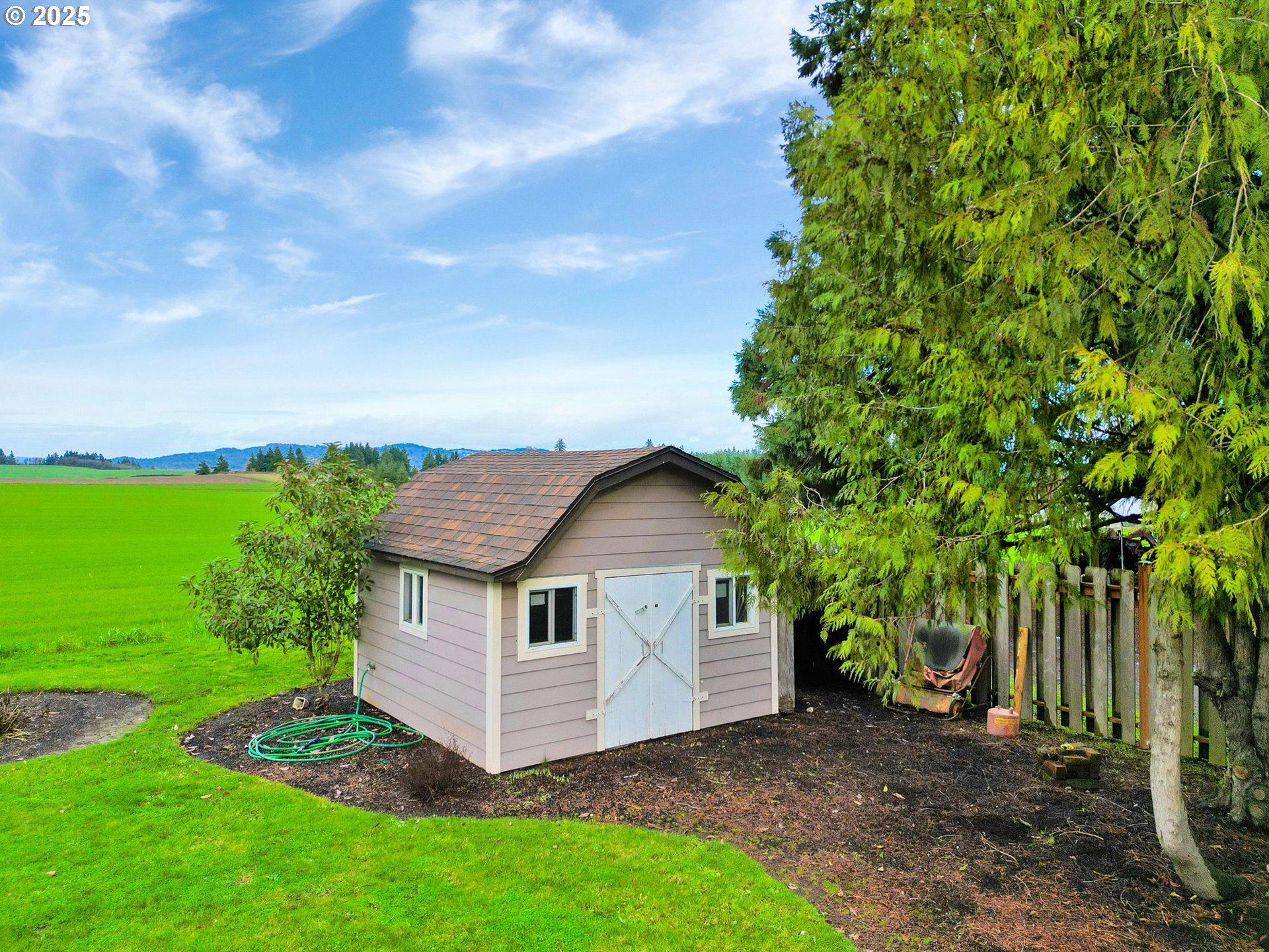 11515 Buena Vista Road Independence, OR 97351 - Photo 39 of 45 a view of a house with a yard