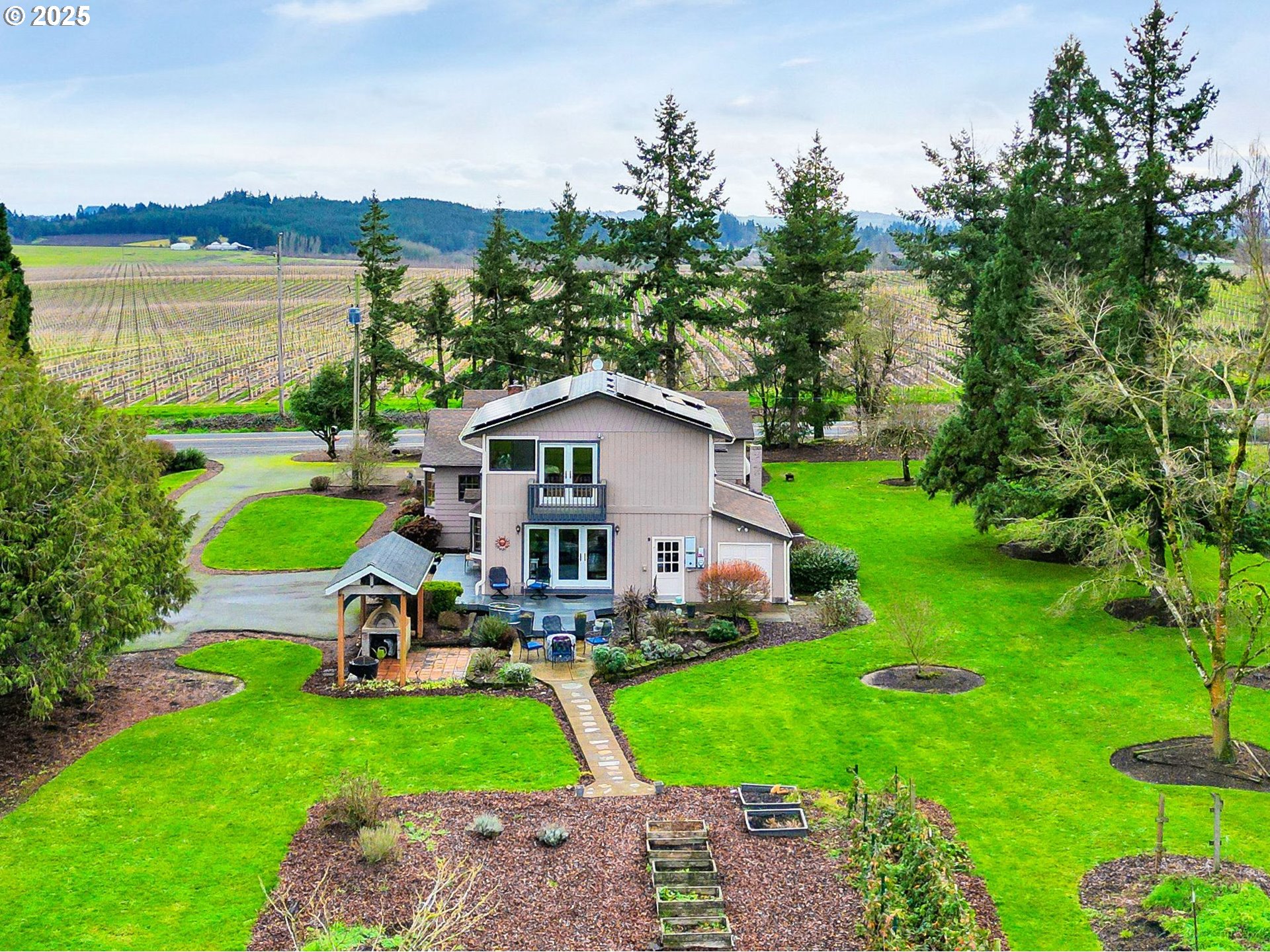11515 Buena Vista Road Independence, OR 97351 - Photo 40 of 45 a front view of a house with garden