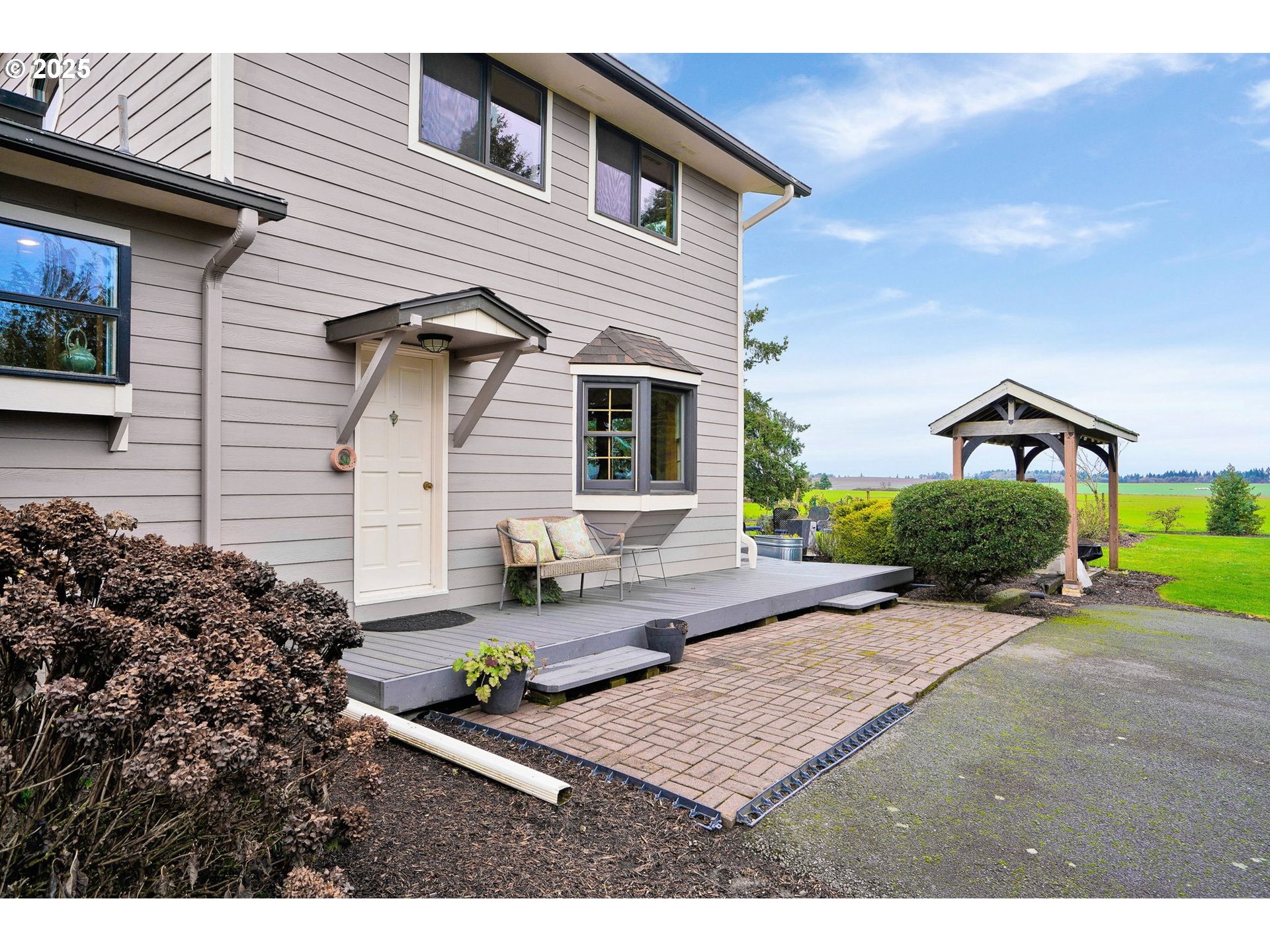 11515 Buena Vista Road Independence, OR 97351 - Photo 4 of 45 a front view of a house with garden