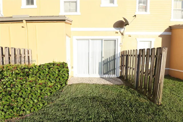 a view of a pathway of a building from a balcony