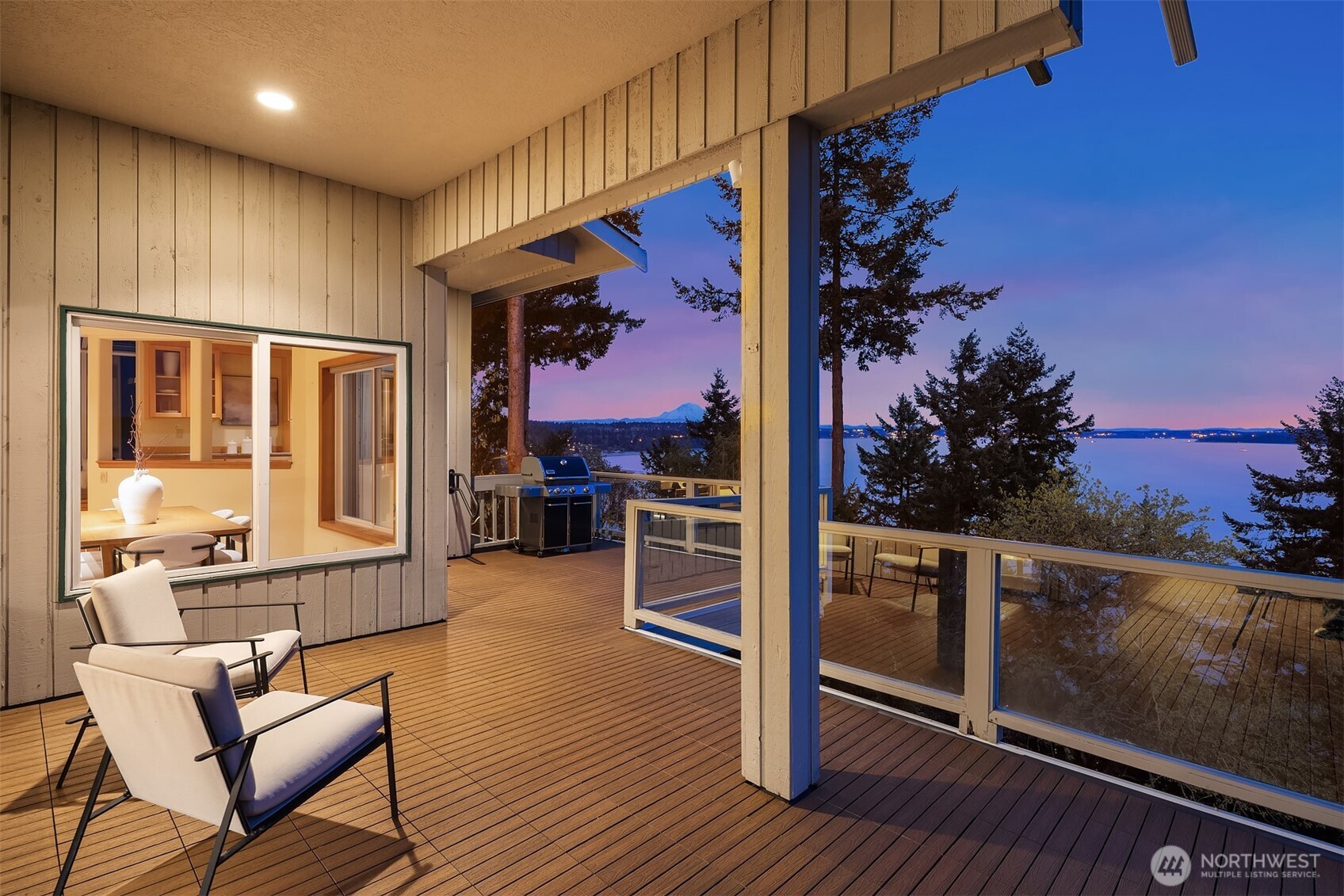 2861 Southwest 171st Street Burien, WA 98166 - Photo 12 of 39 a kitchen with stainless steel appliances granite countertop a refrigerator a stove and a wooden cabinets with wooden floor