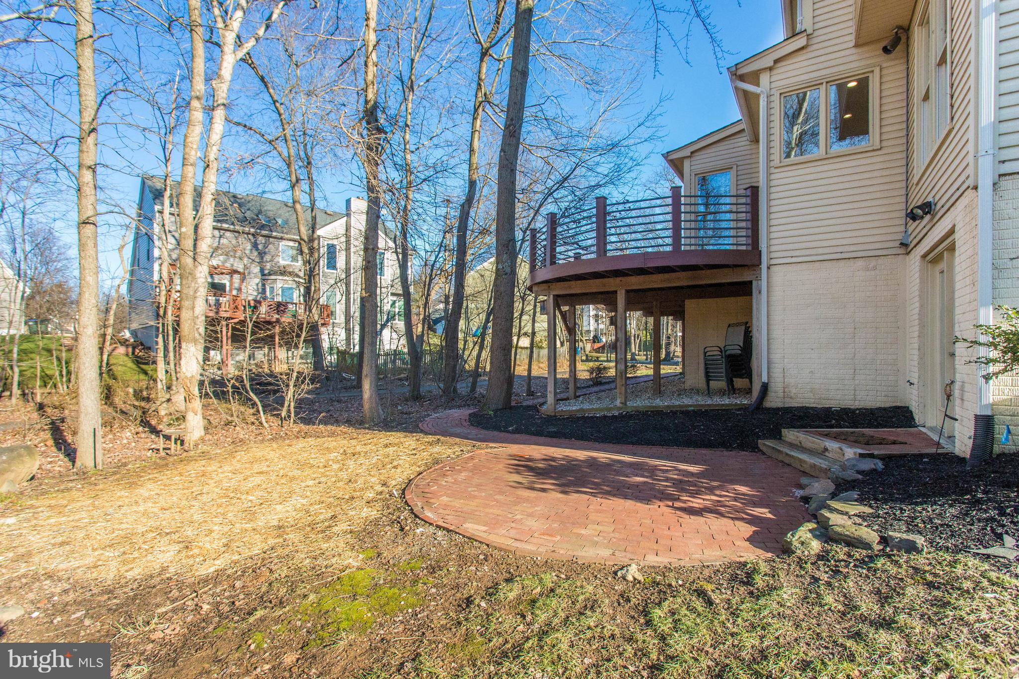 13230 Stable Brook Way Herndon, VA 20171 - Photo 43 of 47 The yard is treed and features a charming patio.