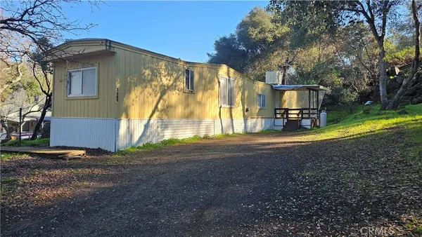 a view of backyard of house